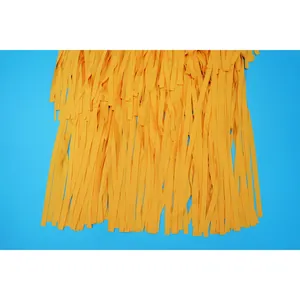 Close-up macro view of the vibrant yellow fringe tassels on an elegant evening dress