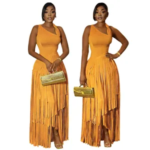 Detailed view of an elegant vibrant orange one-shoulder maxi dress with a tiered fringe skirt.