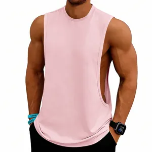 Detail view of pink men's deep-cut gym tank top highlighting side fit and muscle definition