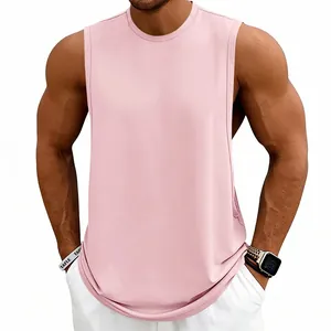 Close-up detail of men's pink loose fit athletic gym training tank top on model