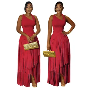 Detail view of the layered fringe hem and elegant one-shoulder design on a red maxi dress.