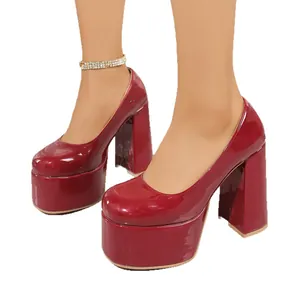 Red patent leather platform pumps featuring chunky block high heels for elegant women