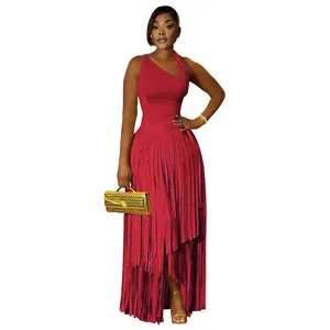 Detail view of an elegant red sleeveless maxi dress with a layered fringe skirt