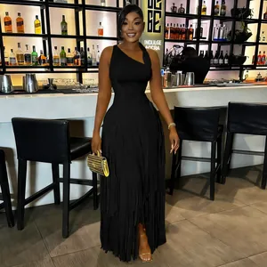 Elegant black one-shoulder fringe evening dress featuring a tiered tassel skirt detail.