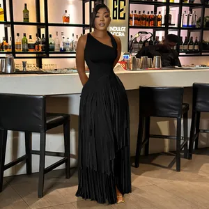 Stunning black sleeveless fringe maxi dress with pleated skirt detail in elegant bar.