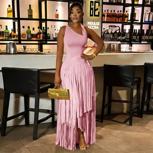 Close-up of the elegant pink fringe skirt detail on this sleeveless slim fit dress