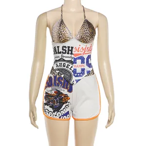Trendy two-piece halter neck top and shorts set with racing graphics and print