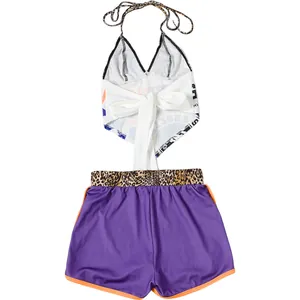 Back view of women's trendy halter neck print top with bow and purple slim shorts