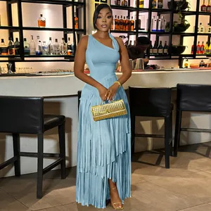 Detail of elegant light blue slim-fit dress with stylish fringe tassel skirt