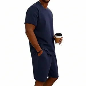 Vista lateral detallada del conjunto deportivo de algodón azul marino para hombre