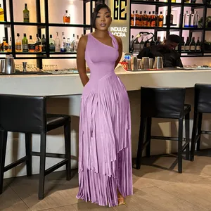 Detail showing lavender one-shoulder fringe maxi dress with elegant layered tassels