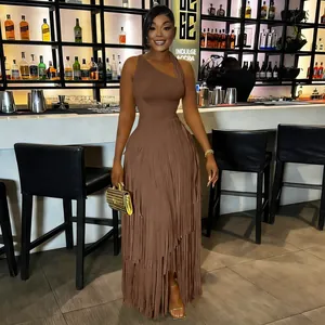 Elegant brown fringe sleeveless evening dress for women in a sophisticated lounge bar