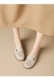 Comfortable beige hollow-out loafers for women with vintage floral metal buckle detail
