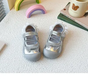 Detailed view of silver mesh ballet sports sandals for girls with cute lace trim and logo strap
