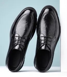 Black breathable perforated leather men's business shoes with classic lace-up detail