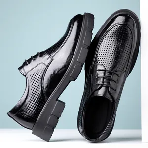 Stylish black men's business dress shoes featuring breathable perforated leather and lace-up