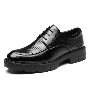 Elegant black men's business dress shoes featuring breathable hollow-out laser design
