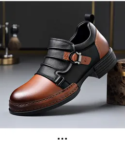 Side view of men's retro brown and black leather low-top boots with buckle detail