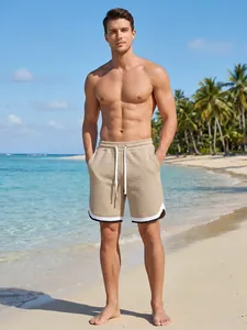 Casual men's checkered shorts with white drawstring and trim, perfect for beach holidays.