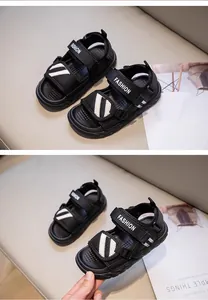 Detailed view of black boys' summer sandals featuring adjustable straps and non-slip soles