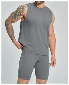 Close-up of men's grey sleeveless sports tank top and matching athletic shorts set.