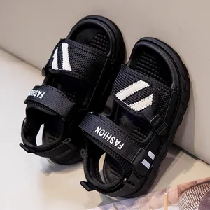 Black boys' summer sandals with adjustable straps and non-slip soles for outdoor activities