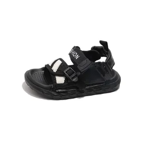 Classic black boys' summer sandals featuring stylish white stripes and non-slip rubber soles