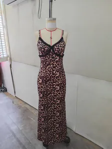 Detailed view of a leopard print V-neck camisole maxi dress with elegant lace trim