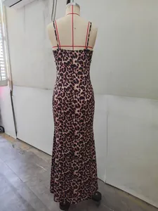 Detailed back view of a classic leopard print slip maxi dress on a tailor mannequin
