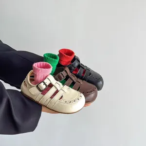 Retro hollowed-out Roman leather sandals for children available in three classic colors