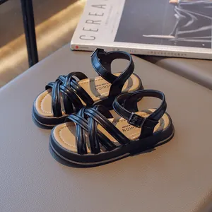 Sandales romaines noires pour filles avec semelle souple et lanières croisées pour l'été