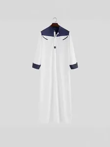 Traditional men's loose white and navy blue Jubba Thobe with buttoned stand collar