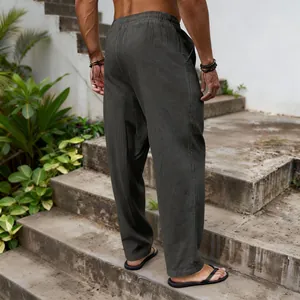 Detail of men's loose breathable cotton linen trousers shown from the back view