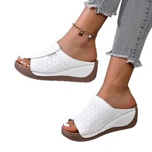 Stylish women's white laser-cut wedge sandals with comfortable platform sole for summer