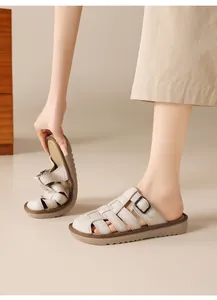 Detailed view of flexible soft-sole beige retro flat sandals for women's daily summer wear.