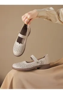 Vintage style breathable hollow-out Mary Jane shoes for women featuring soft non-slip soles