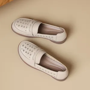 Elegant beige hollow-out soft leather loafers for women with comfortable flat soles