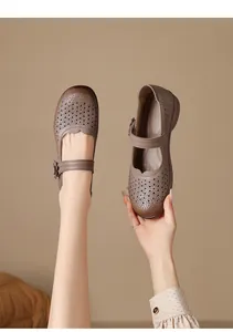 Detailed macro view of retro hollow-out breathable leather Mary Jane shoes for women