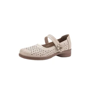 Elegant beige hollow-out breathable Mary Jane shoes for women with floral detail.