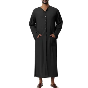Detail of a traditional black men's long-sleeved robe with buttoned V-neck and pockets