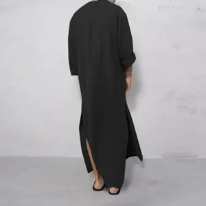 Back view of a loose fit black traditional men's robe with high side slits and long sleeves
