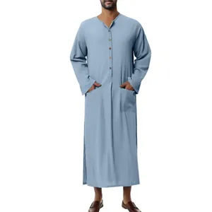 Detail view of a men's traditional long sleeve light blue robe with button placket.