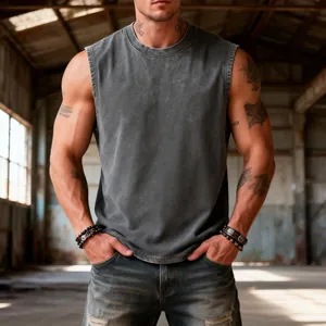 Detail of men's vintage washed cotton tank top with distressed texture in industrial setting
