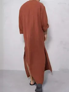 Men's traditional loose-fit rust-colored long robe with standing collar and side slits