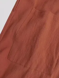 Detailed close-up of the front pocket on a men's vintage breathable cotton linen robe