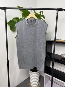 Close-up of vintage acid-washed grey sleeveless tank top in heavy pure cotton texture.