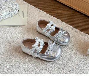 Silver girls' princess shoes with floral lace straps and bow detail