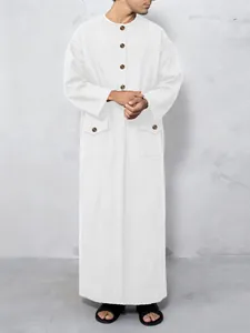 Elegant white men's long-sleeved thobe featuring front buttons and flap pockets.