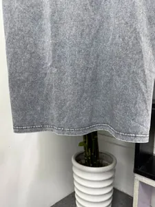 Close-up detail of the hem and stone-wash texture on a vintage heavy cotton tank top