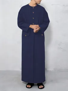 Elegant navy blue long-sleeve thobe with round neck and functional buttoned flap pockets